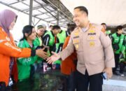 Bangun Sinergi, Kapolres Gresik Gelar Dialog Interaktif dan Bagi Bansos ke Driver Ojol